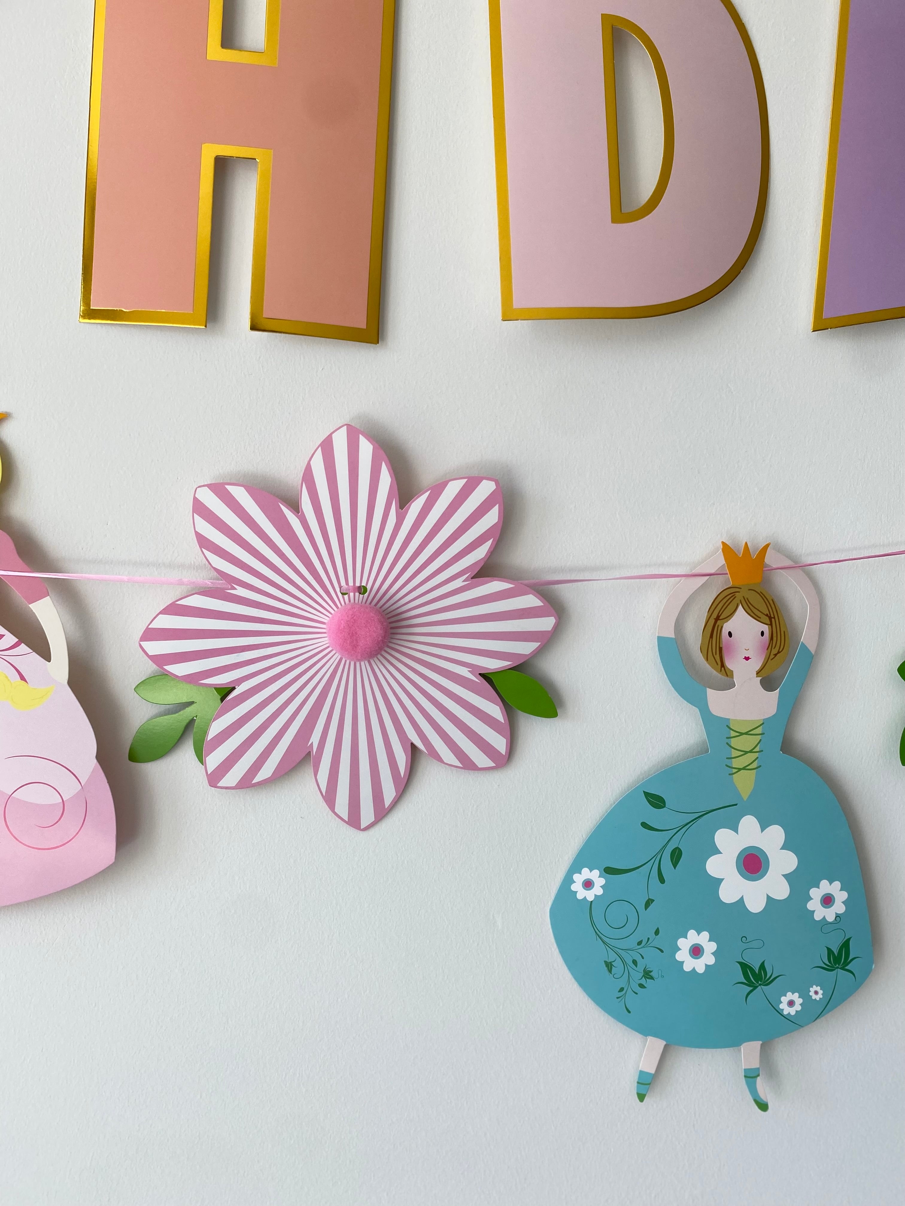 Prinsessenslinger met bloemen en pompons