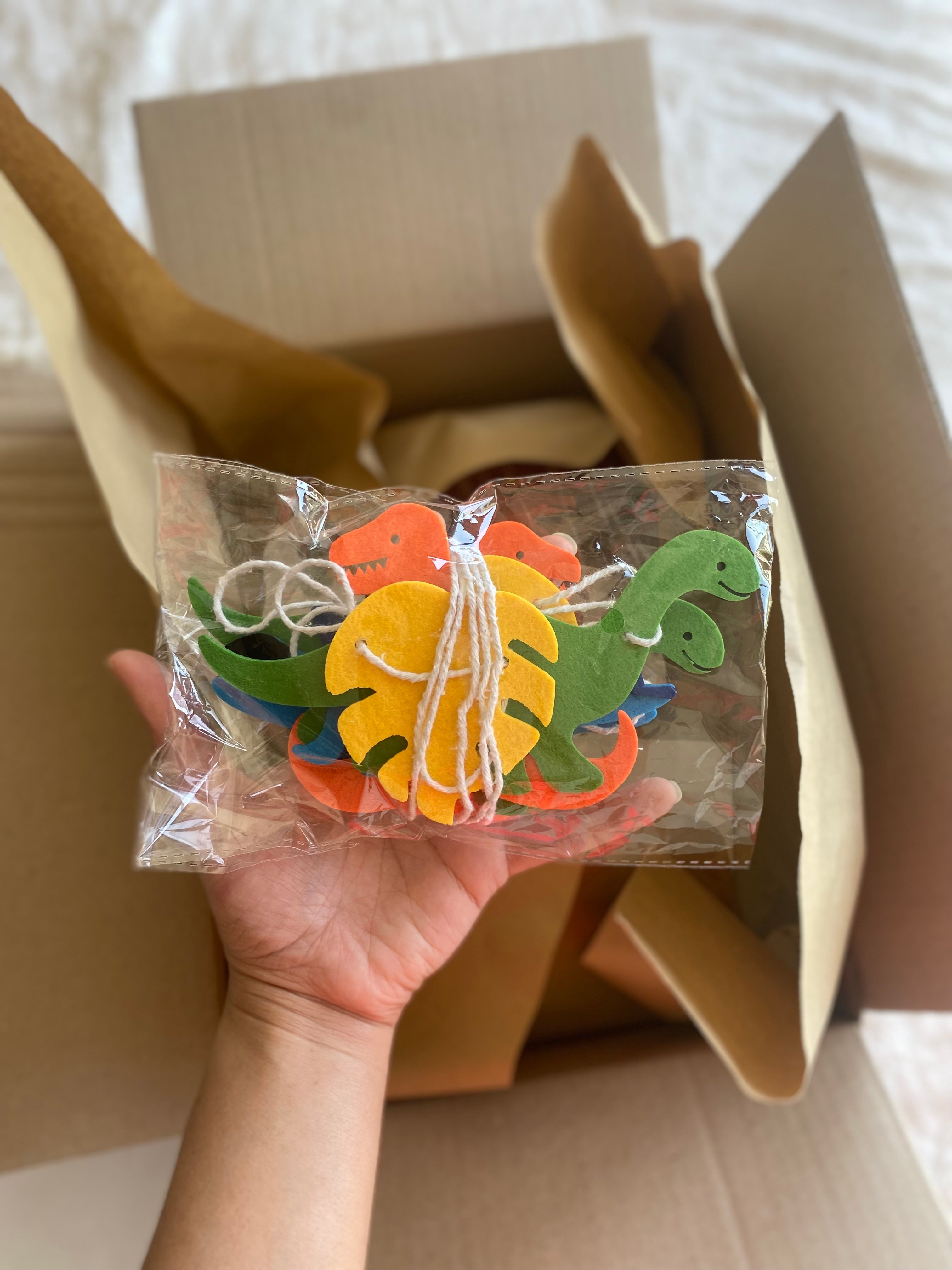 Felt dinosaur garland